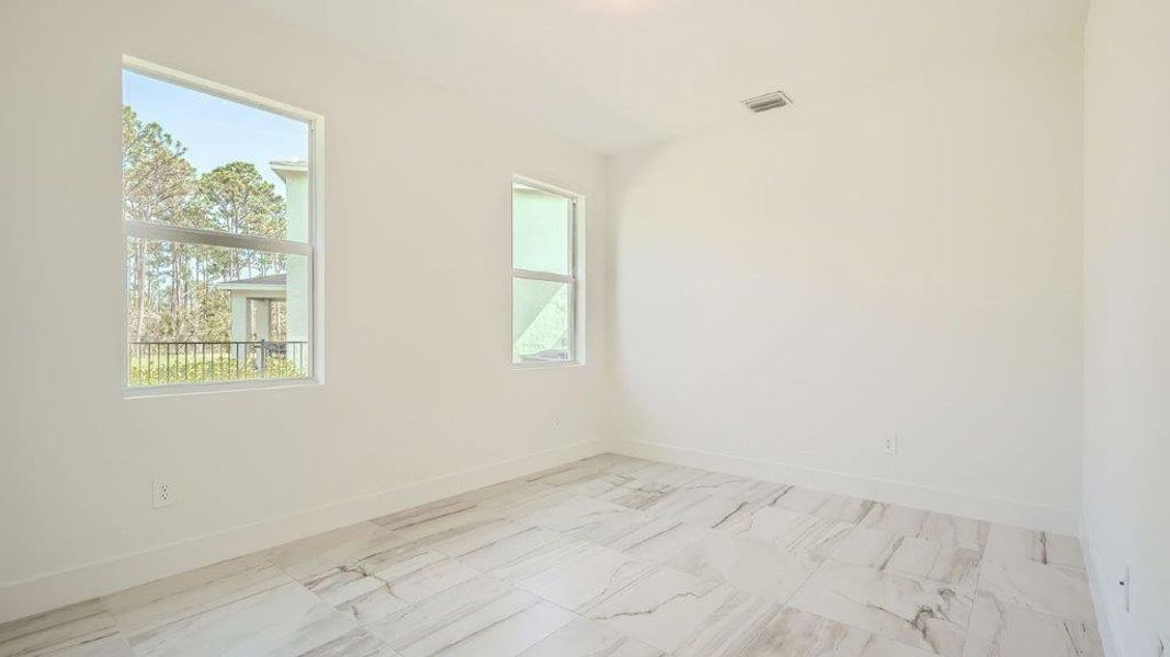 Representative unfurnished interior of a home built from the Ponte Vedra by D.R. Horton in Preserves at Park Trace, Stuart (Image 14).