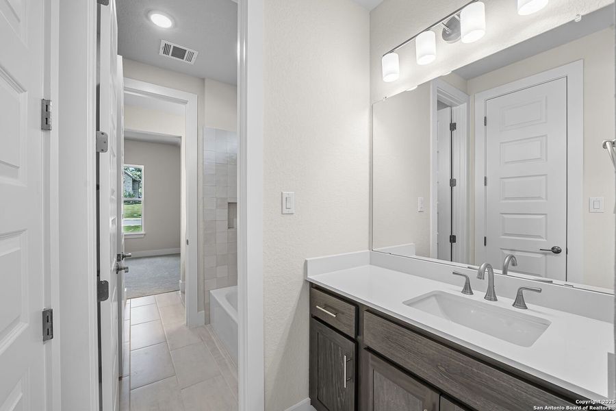 Furnished interior view inside a new home in Arbors at Fair Oaks, Fair Oaks Ranch (Image 15).