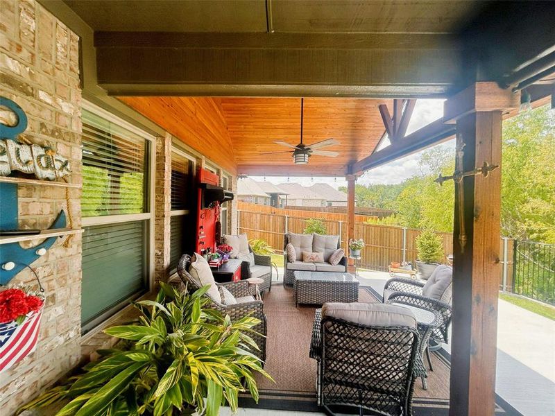 View of patio / terrace with ceiling fan and an outdoor hangout area