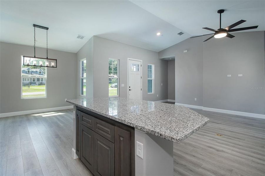 Breakfast bar area with Granite Countertops