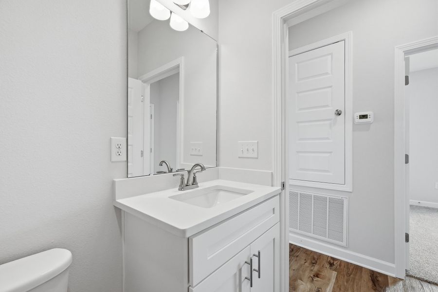 Furnished interior view inside a new home in Southern Charm, Crestview (Image 10).