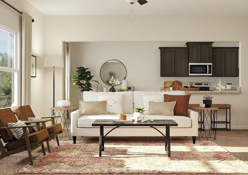 Rendering of living room focused on white
  couch, brown coffee table and two armchairs with dining and kitchen areas in
  the background