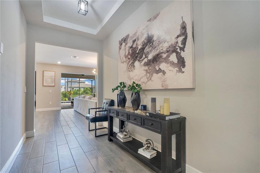 Furnished interior view inside a new home in Legends Preserve - Reserve Series, Daytona Beach (Image 9).