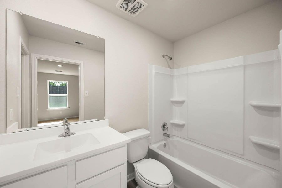 Furnished interior view inside a new home in Vacek Country Meadows, Richmond (Image 3).