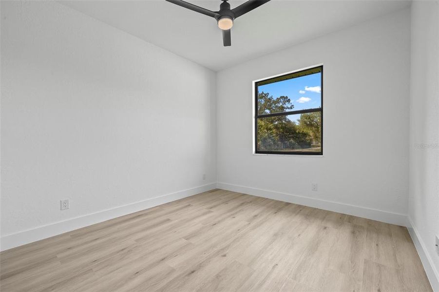 Spacious, unfurnished interior of a new home in , Port Charlotte (Image 27).