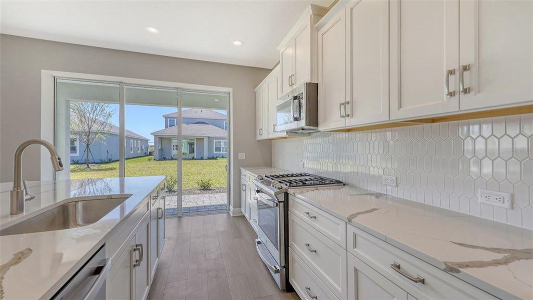 Furnished interior view inside a new home in Wildleaf, Parrish (Image 8).