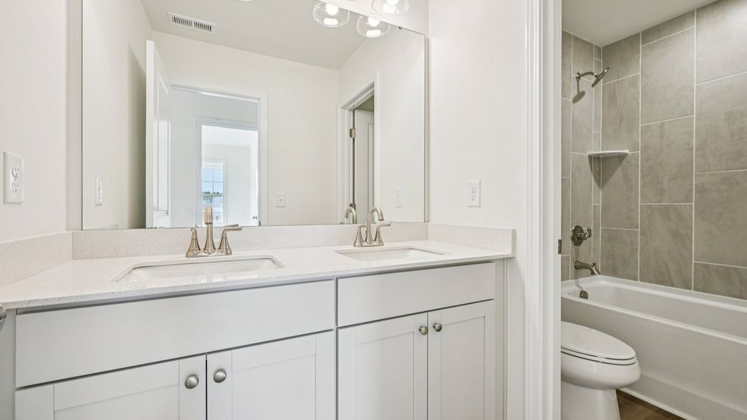 Representative furnished interior of a home built from the Juniper by DRB Homes in Sidney Creek Single Family, Zebulon (Image 15). Representative furnished interior of a home built from the Juniper by DRB Homes in Sidney Creek Single Family, Zebulon (Image 15).