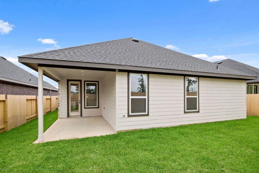 Exterior details and patio area of a home in Mill Creek Estates, Magnolia (Image 13).