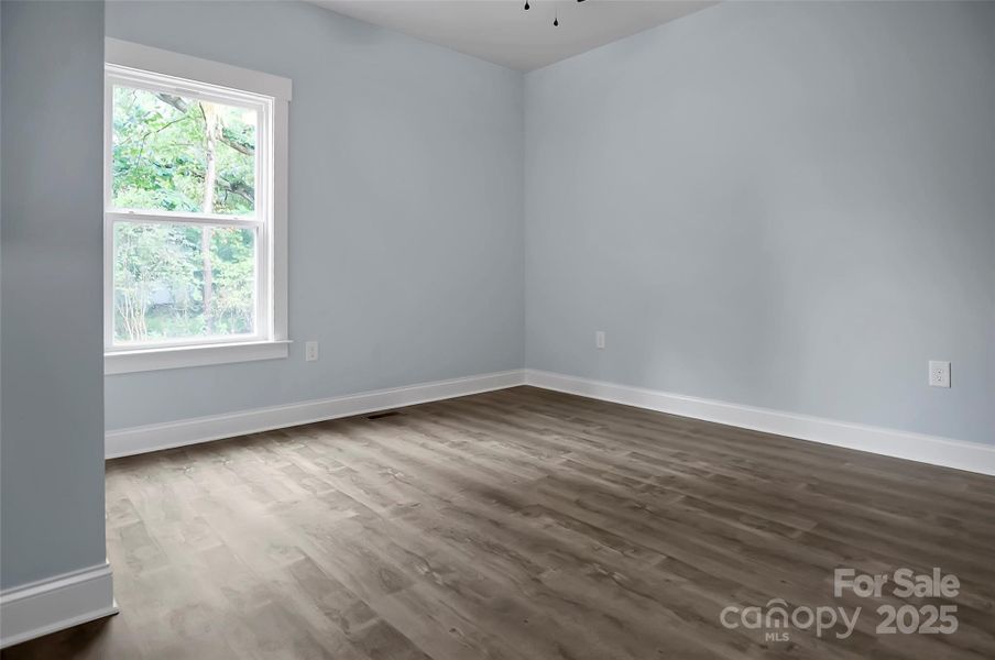 Spacious, unfurnished interior of a new home in , Iron Station (Image 28).