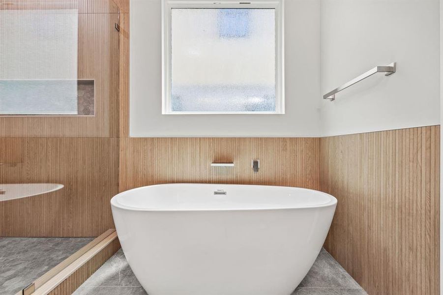 Bathroom with tile patterned floors