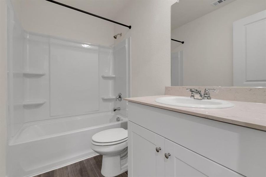 Furnished interior view inside a new home in Creekview Fossil Ridge, Pilot Point (Image 7).