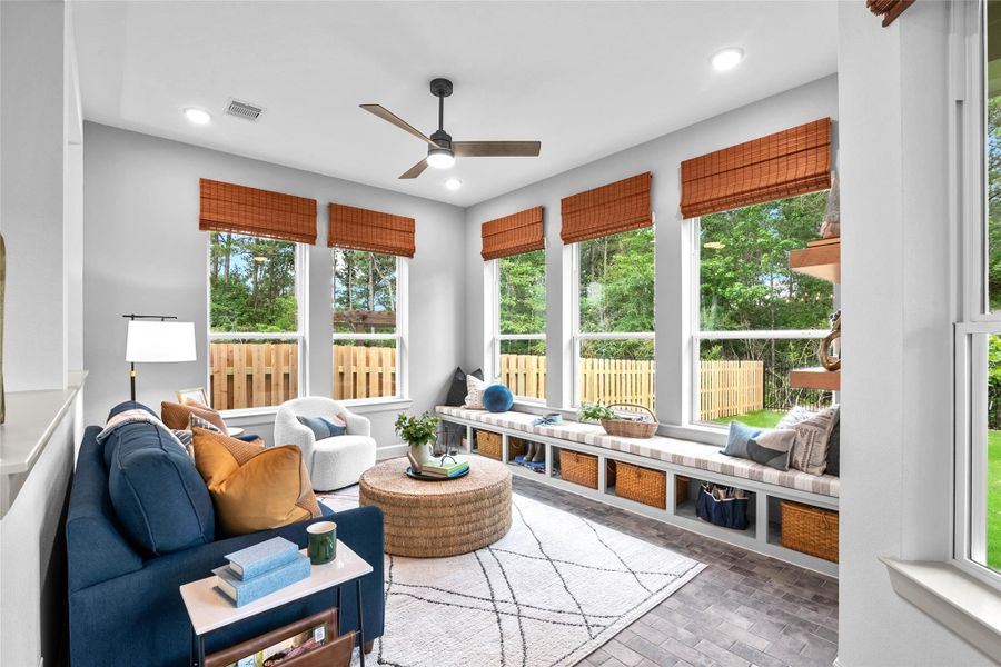 REPRESENTATIVE PHOTO: Spacious Sunroom is surrounded by windows, bathing the room with sunlight!  Use it as a hobby room, TV room or playroom!  Whatever fits your lifestyle!