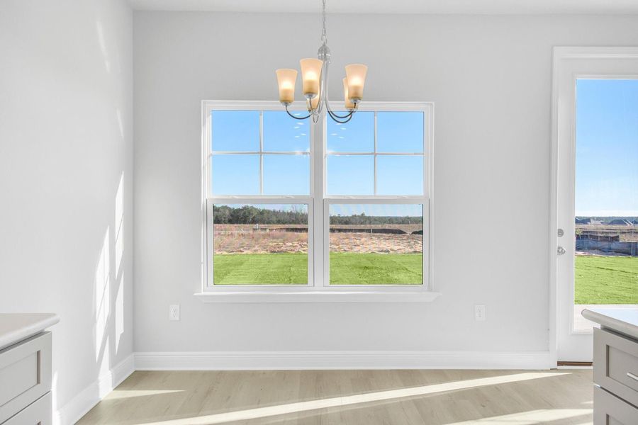 Representative unfurnished interior of a home built from the Plan 1817 by Adams Homes in Pine Top, Cantonment (Image 17).