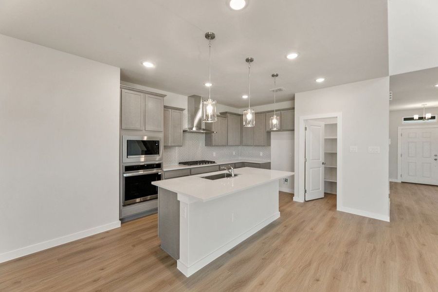 Representative unfurnished interior of a home built from the Poinsettia by Hakes Brothers in Veranda Signature, San Antonio (Image 19). Representative unfurnished interior of a home built from the Poinsettia by Hakes Brothers in Veranda Signature, San Antonio (Image 19).