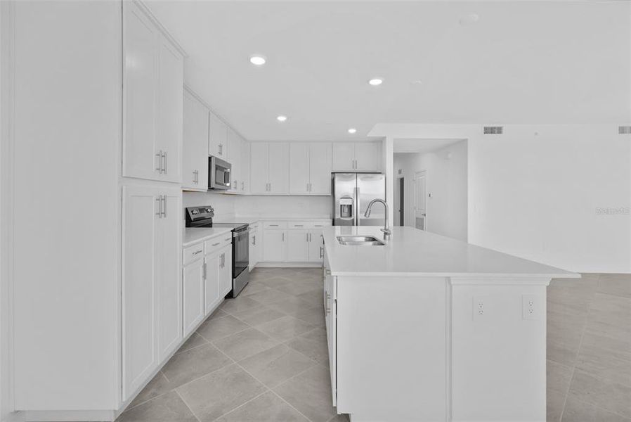 Furnished interior view inside a new home in Wellen Park Golf & Country Club, Venice (Image 4).