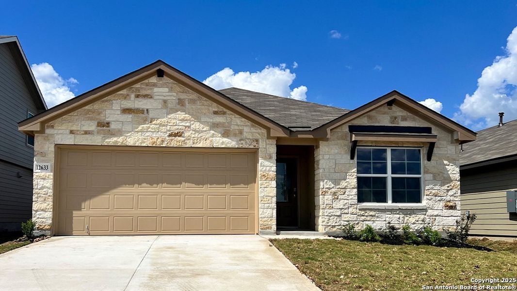 Front exterior of a new home in Avenida, Converse, TX, highlighting curb appeal (Image 1). Front exterior of a new home in Avenida, Converse, TX, highlighting curb appeal (Image 1).