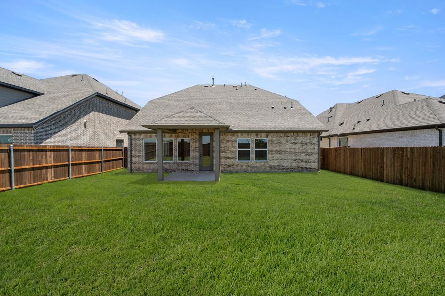 Exterior details and patio area of a home in Wildflower Ranch, Fort Worth (Image 3).