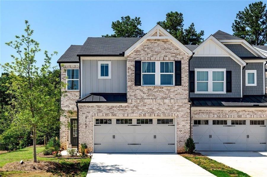 Front exterior of a new home in , Mableton, GA, highlighting curb appeal (Image 19).