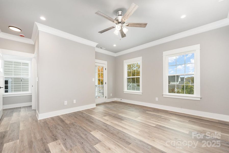 Primary bedroom with balcony Primary bedroom with balcony