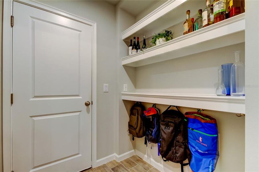 Wait, additional flex space between the kitchen and garage.