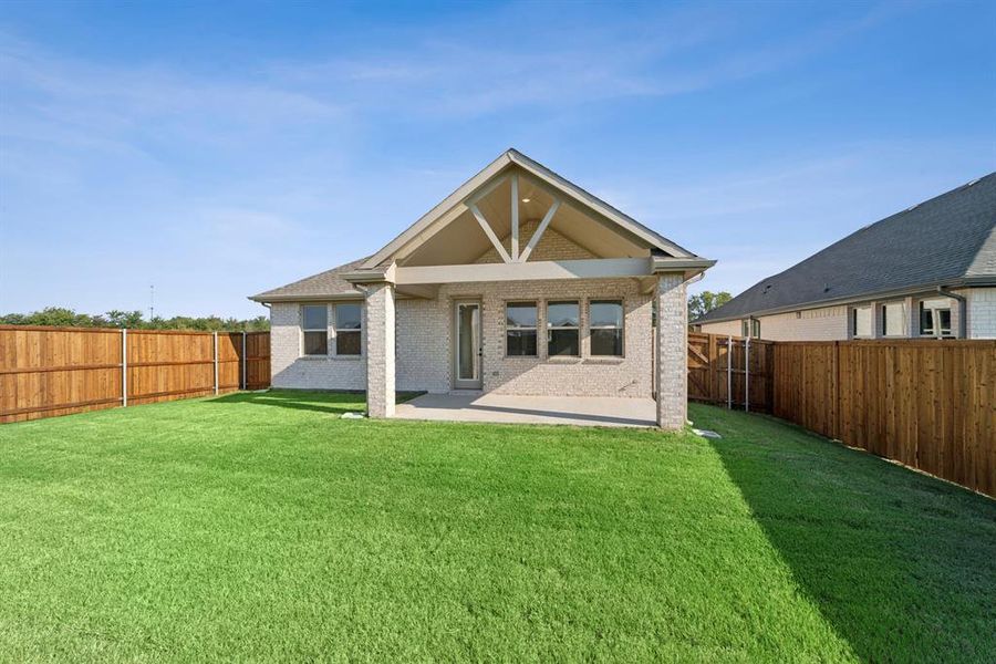 Front exterior of a new home in Heritage Ranch, Sherman, TX, highlighting curb appeal (Image 2). Front exterior of a new home in Heritage Ranch, Sherman, TX, highlighting curb appeal (Image 2).