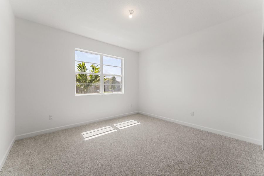 Spacious, unfurnished interior of a new home in Tradition - Cadence, Port St. Lucie (Image 9).