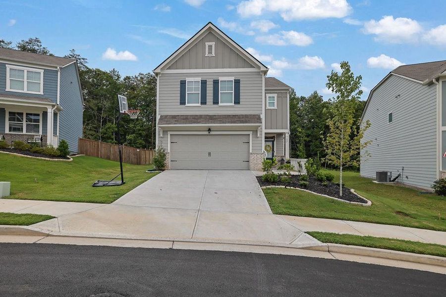Front exterior of a new home in , Dawsonville, GA, highlighting curb appeal (Image 2).