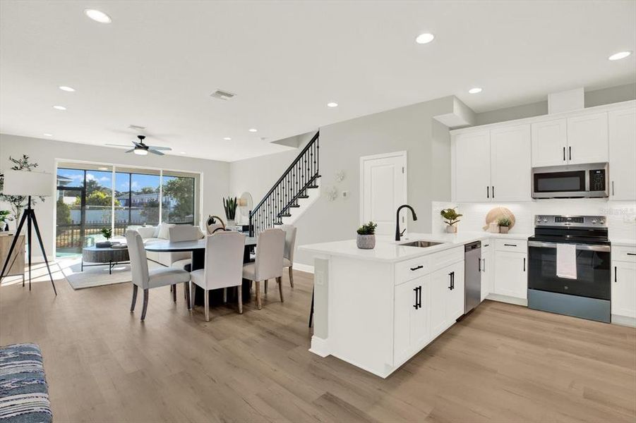 Furnished interior view inside a new home in The Towns At Long Bayou, Seminole (Image 9). Furnished interior view inside a new home in The Towns At Long Bayou, Seminole (Image 9).