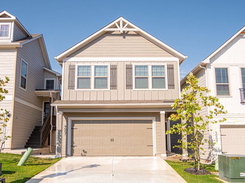 Representative exterior photo of a completed home built from the The Osbourne by Rosehaven Homes in Magnolia Village, San Antonio, TX (Image 1).