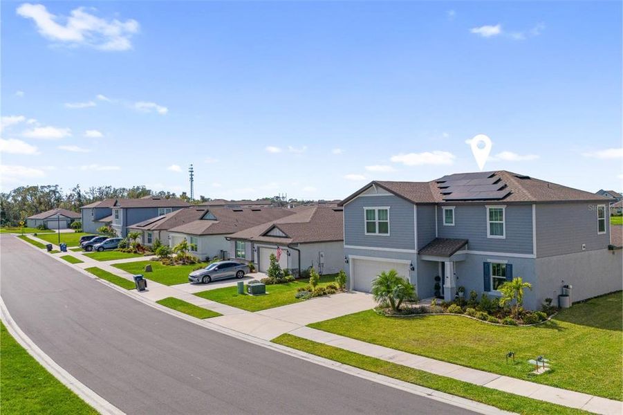 Front exterior of a new home in , Parrish, FL, highlighting curb appeal (Image 21).