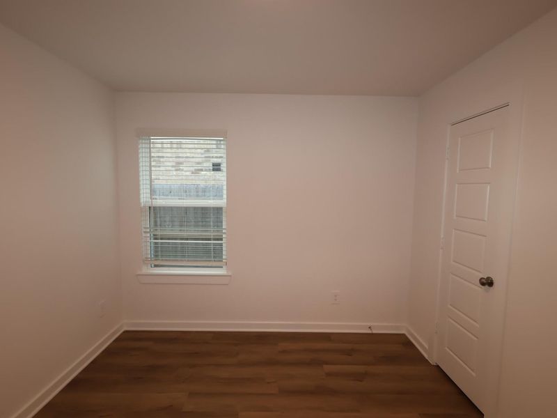 Spacious, unfurnished interior of a new home in Pinewood at Grand Texas, New Caney (Image 30).