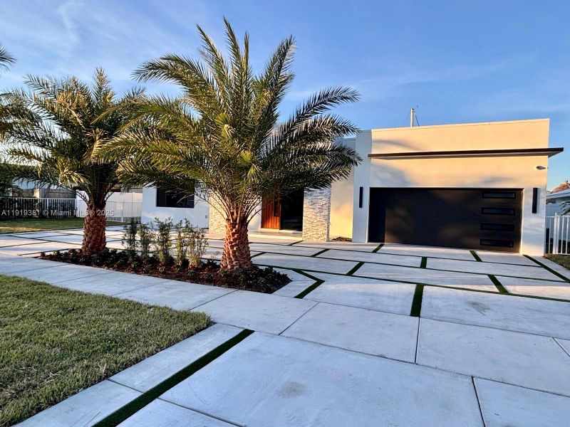 Front exterior of a new home in , Deerfield Beach, FL, highlighting curb appeal (Image 2).