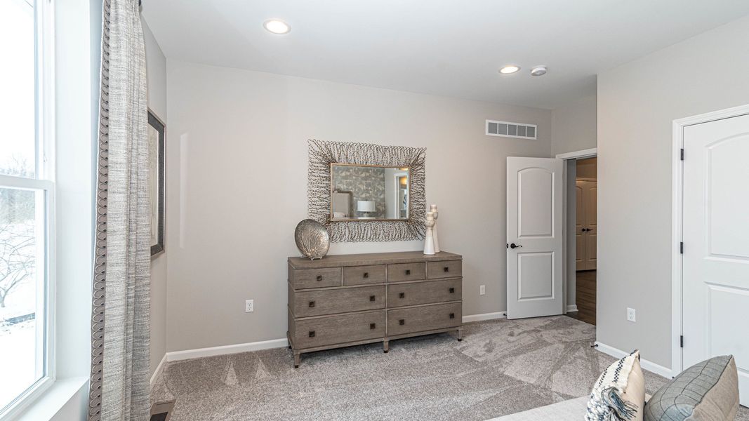 Representative furnished interior of a home built from the The Kensington by Norfolk Homes in Valleys, Jackson (Image 31).