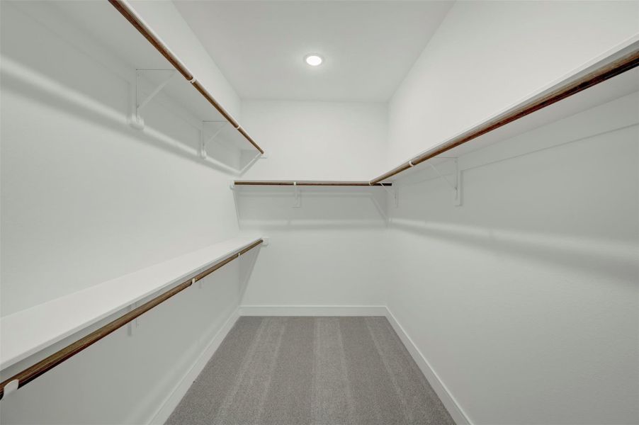 Primary walk-in closet (*Photo not of actual home and used for illustration purposes only.) Primary walk-in closet (*Photo not of actual home and used for illustration purposes only.)