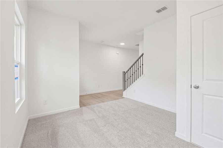 Spacious, unfurnished interior of a new home in The Pointe at Heron Bay, Locust Grove (Image 16).