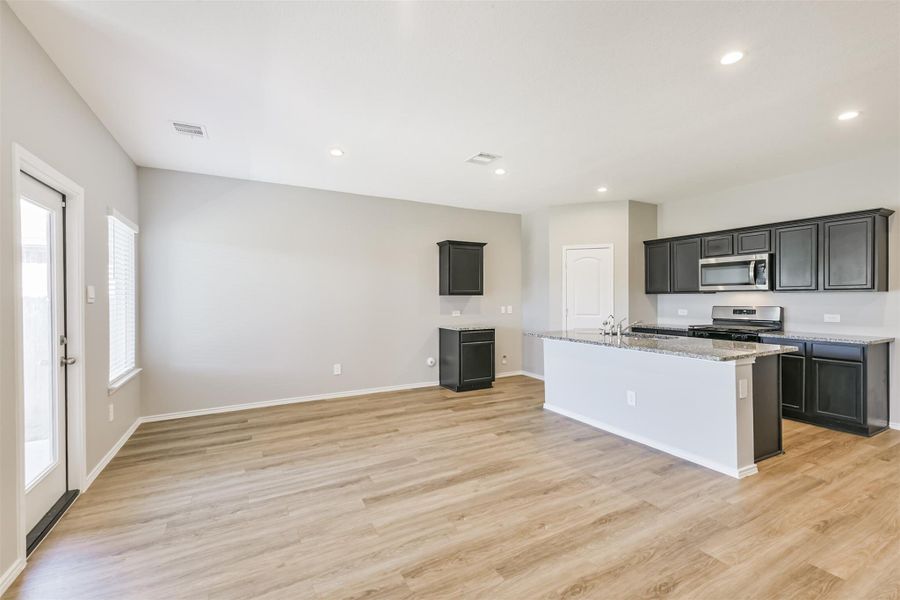 Furnished interior view inside a new home in Harrington Trails at The Canopies, New Caney (Image 5).