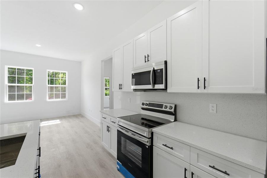 Furnished interior view inside a new home in , Dunnellon (Image 11).