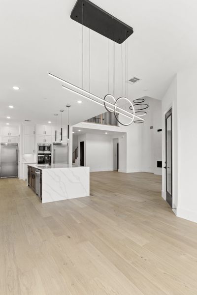 Representative unfurnished interior of a home built from the 6051 by Tradition Homes in Mustang Lakes, McKinney (Image 21).