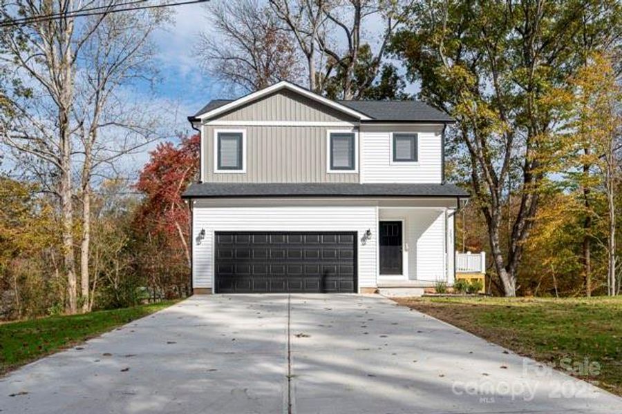 Front exterior of a new home in , Newton, NC, highlighting curb appeal (Image 2).