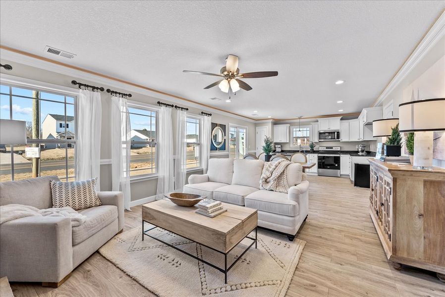 Representative furnished interior of a home built from the Sumter by Enchanted Homes in Lonesome Dove, San Antonio (Image 14).
