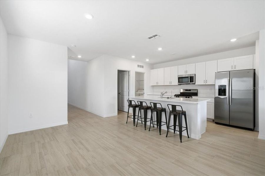 Furnished interior view inside a new home in Two Rivers: The Manors II, Zephyrhills (Image 14). Furnished interior view inside a new home in Two Rivers: The Manors II, Zephyrhills (Image 14).