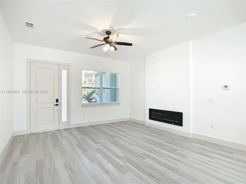 Spacious, unfurnished interior of a new home in , Port Charlotte (Image 42).