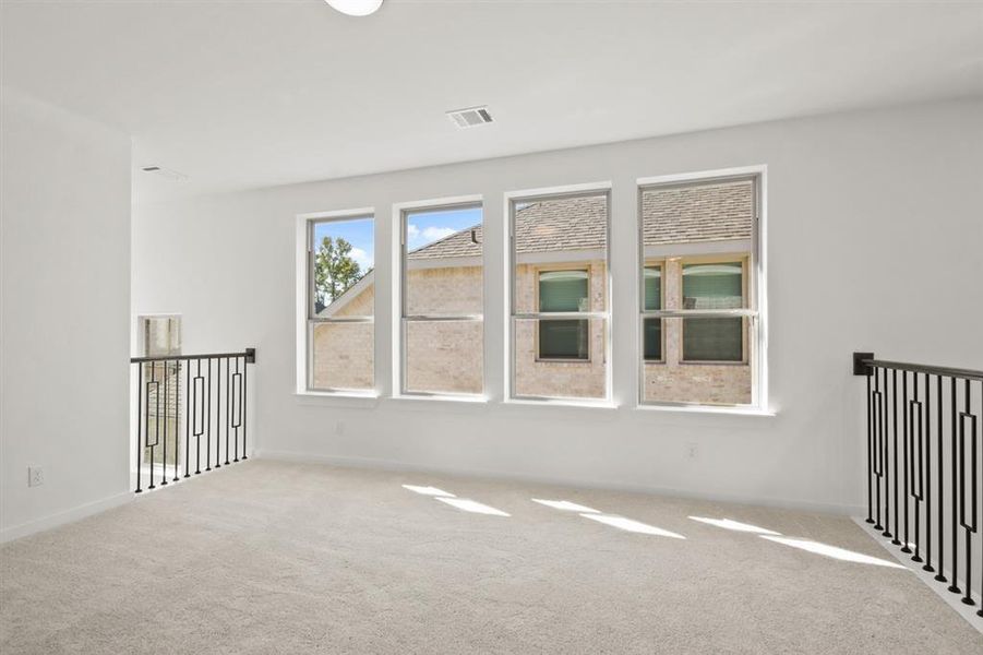 Natural light in the loft for a craft area or play area!