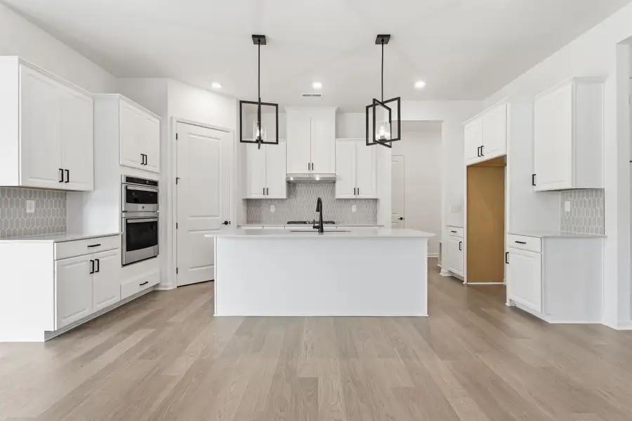 Furnished interior view inside a new home in River Falls, Tega Cay (Image 5).