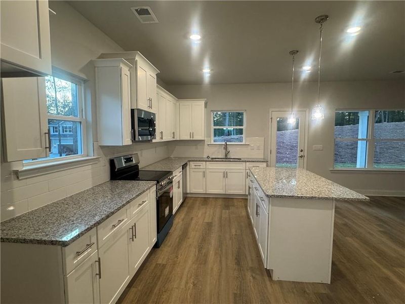 Furnished interior view inside a new home in The Fields of Walnut Creek, Pendergrass (Image 7).