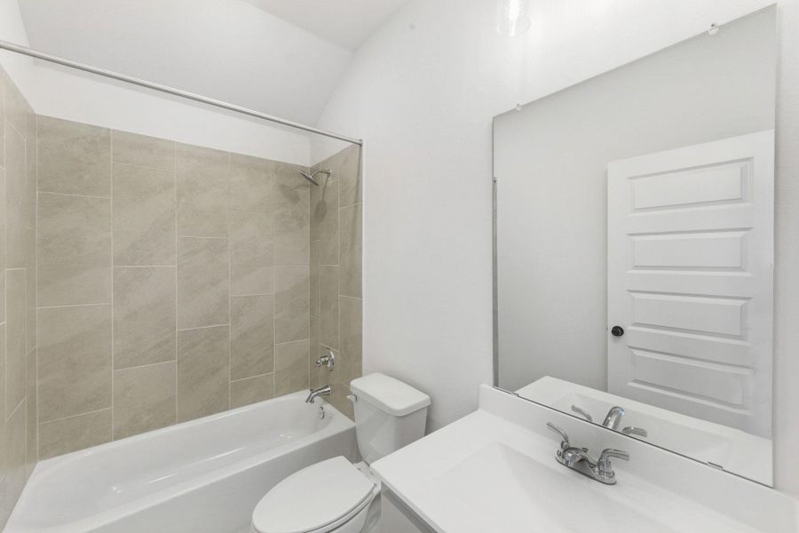 Furnished interior view inside a new home in The Colony, Bastrop (Image 12).