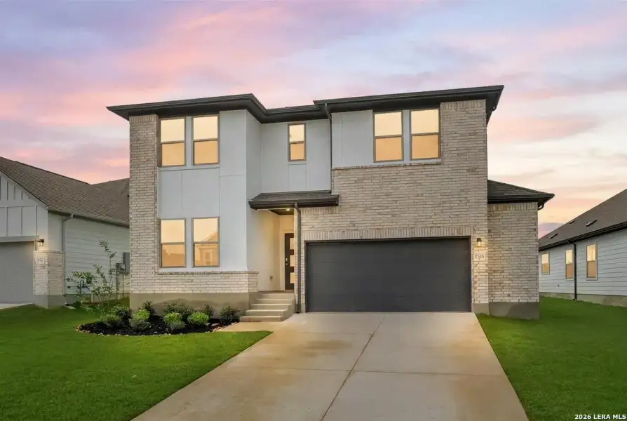 Front exterior of a new home in Garden Grove, San Antonio, TX, highlighting curb appeal (Image 1). Front exterior of a new home in Garden Grove, San Antonio, TX, highlighting curb appeal (Image 1).