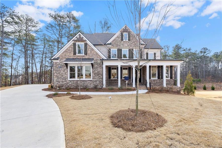 Front exterior of a new home in , Powder Springs, GA, highlighting curb appeal (Image 20). Front exterior of a new home in , Powder Springs, GA, highlighting curb appeal (Image 20).