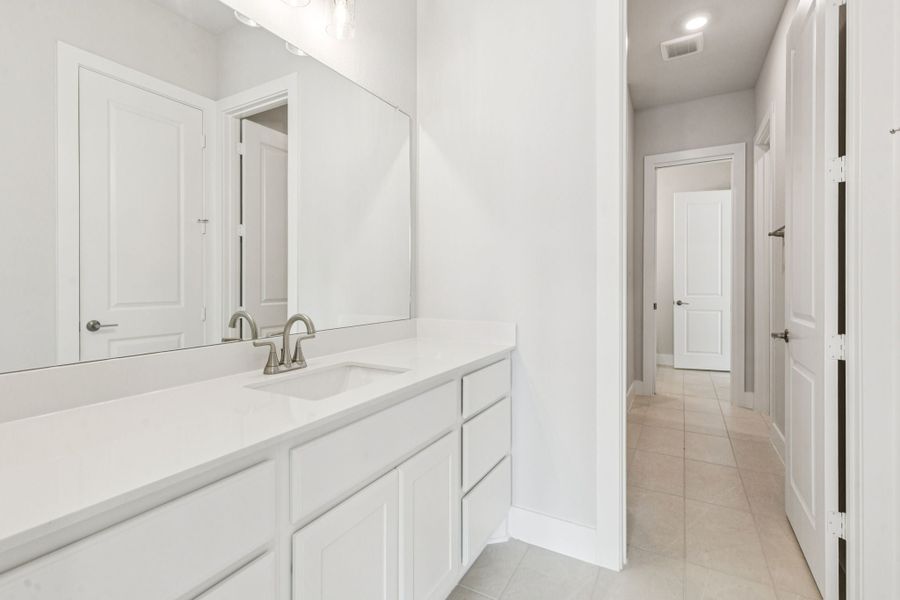 Representative furnished interior of a home built from the Hamilton by Centre Living Homes in Newman Village Townhomes, Frisco (Image 12).