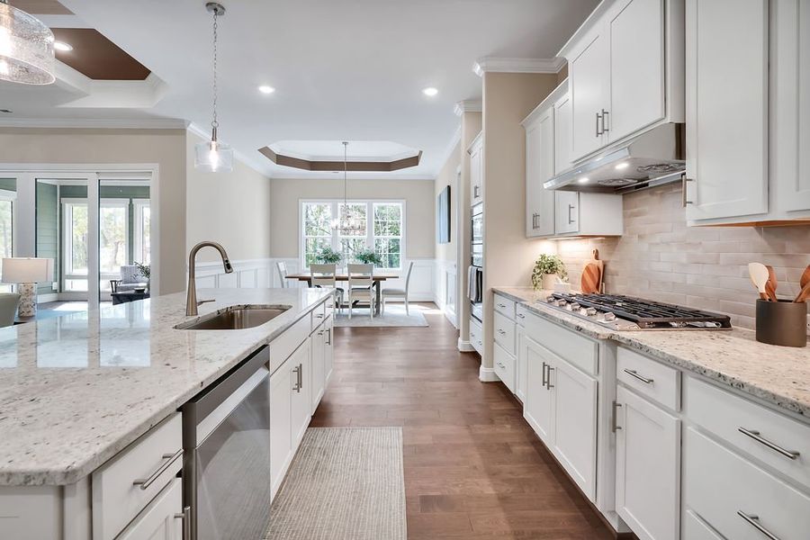 Furnished interior view inside a new home in The Bluffs On the Cape Fear, Leland (Image 9).